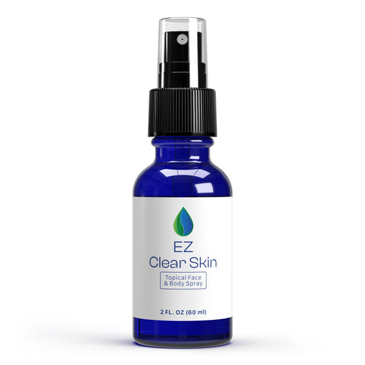 IodinePure EZ Clear Skin 60ml cobalt blue glass spray bottle photographed on a white background