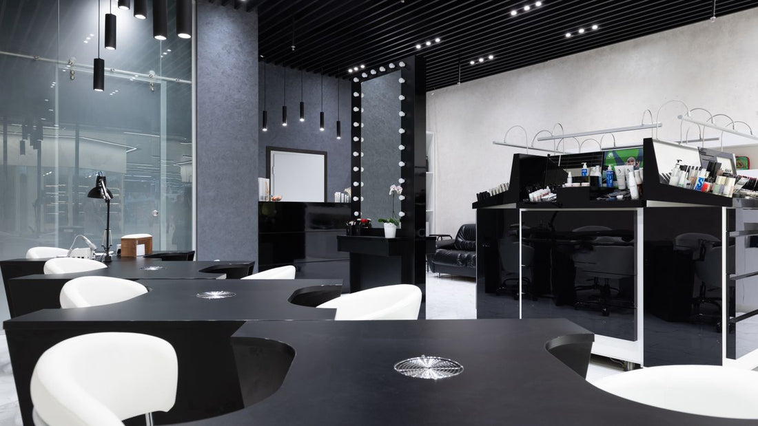 Interior of a modern nail salon with manicure stations