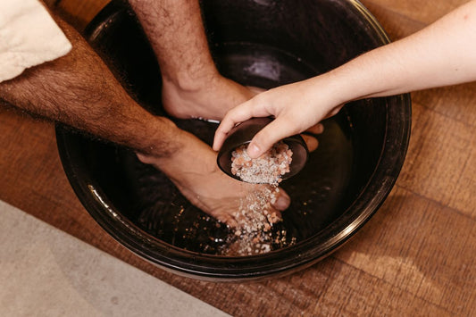 Feet soaking in a basin of water, the format used for a Listerine foot soak