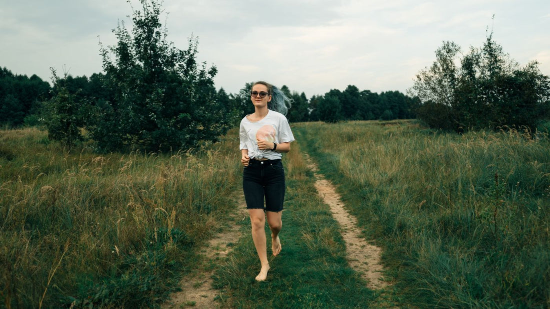 Barefoot walking on a grassy path