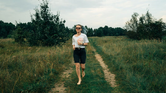 Barefoot walking on a grassy path