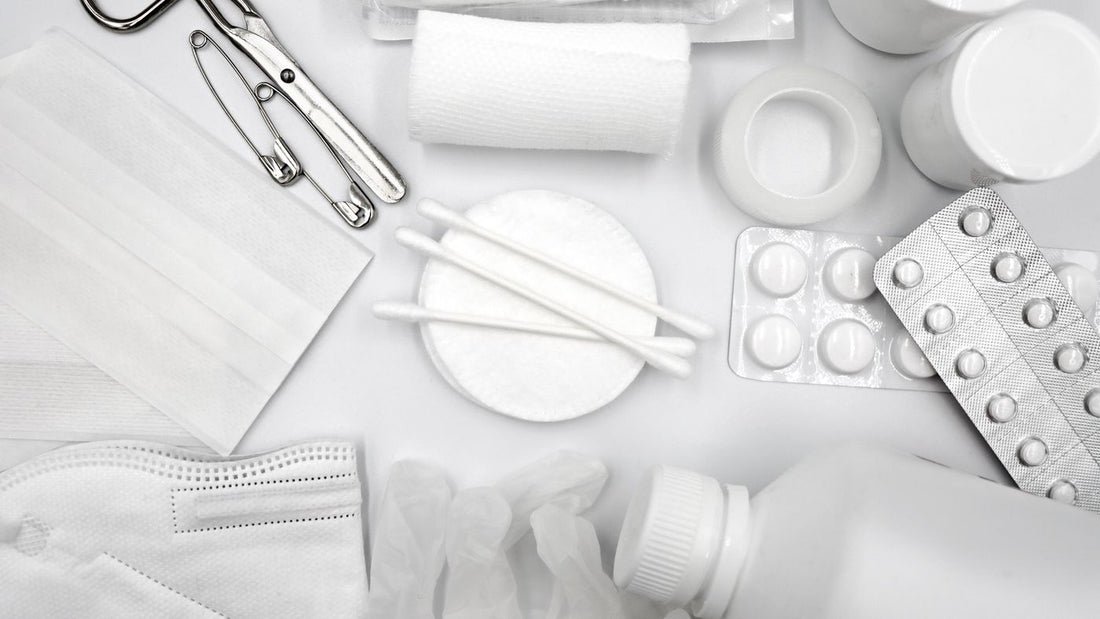 Flat lay of basic first aid supplies