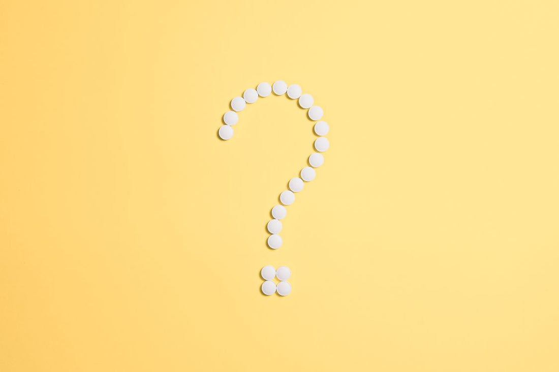 Medicine bottles and pills comparison — Jublia vs IodinePure toenail fungus treatment research