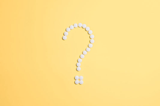 Medicine bottles and pills comparison — Jublia vs IodinePure toenail fungus treatment research