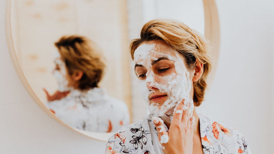 Person following a gentle skincare routine at home
