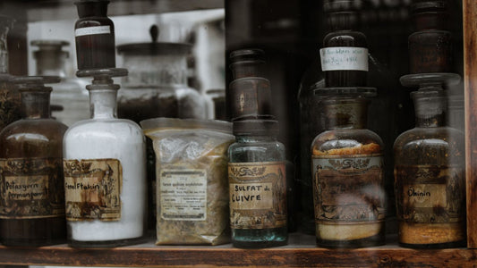 Apothecary bottles with handwritten labels