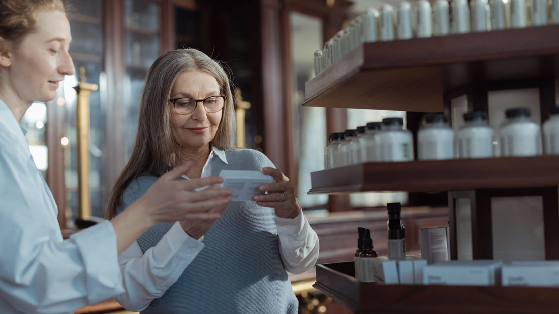 Customer being helped at a pharmacy counter