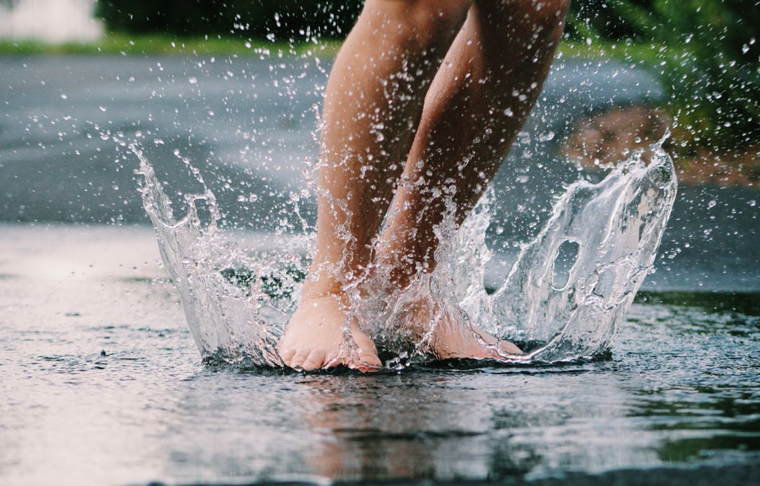 Bare feet in water, the soaking format behind most nail fungus home remedies