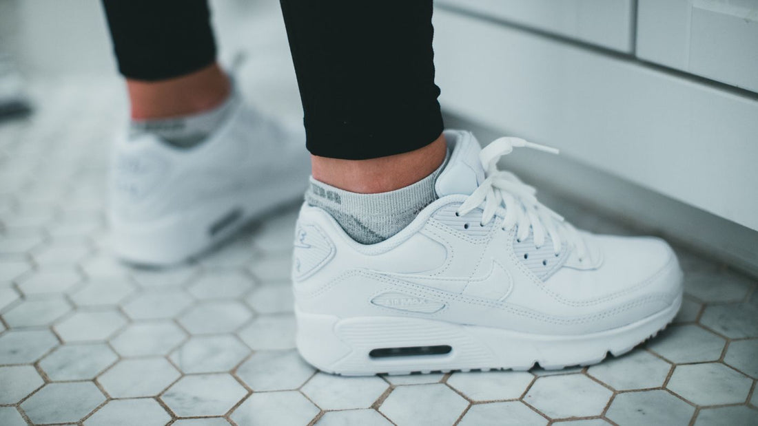 Trainers on a tiled floor